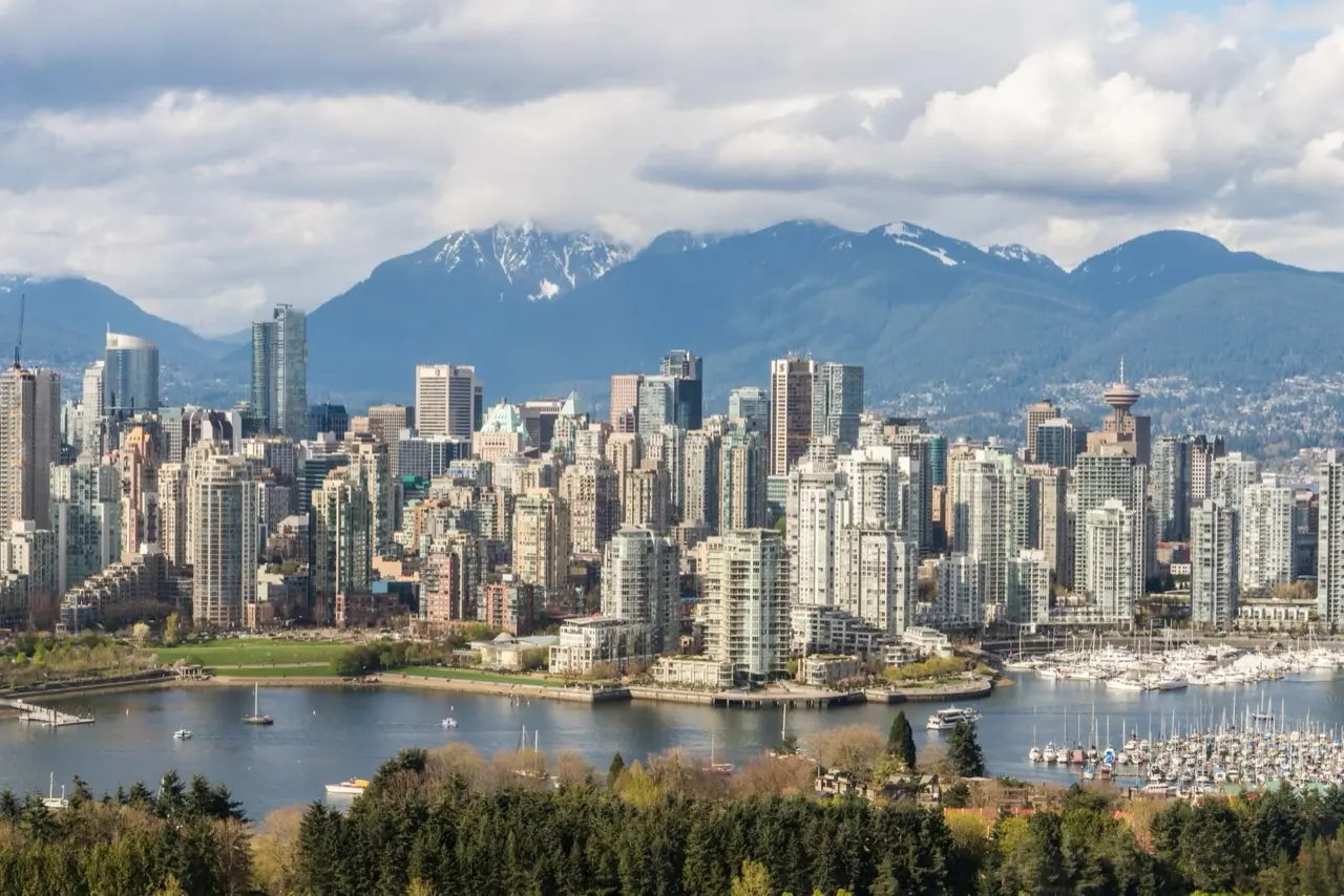 Vancouver towers and False Creek with the North Shore mountains behind